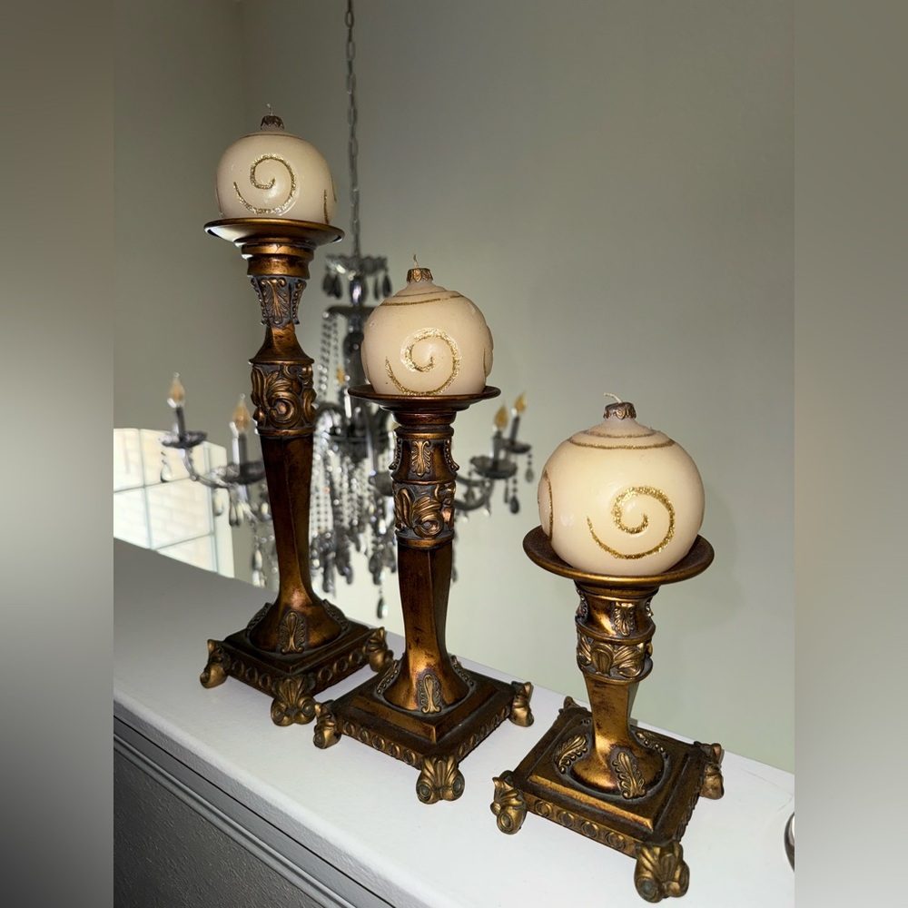 Elegant Gold Candle Holders with Cream Candles